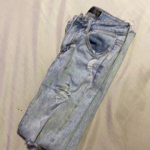 light washed blue ripped jeans